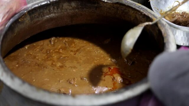Mutton nihari curry at an Indian restaurant in Zakir Nagar, New Delhi