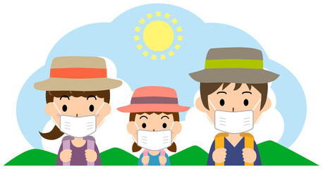 マスクをして登山をする親子