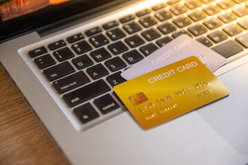 credit card on computer keyboard