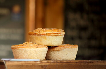 Close up photo of three traditional classic English pies.