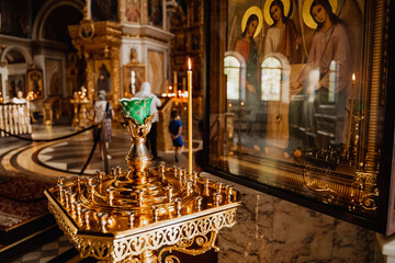 interior decoration of the Church, candles, altar, dim light