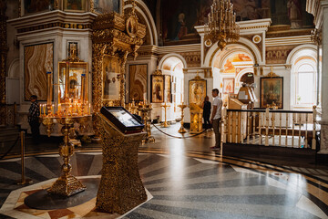 interior decoration of the Church, candles, altar, dim light