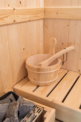Fototapeta na wymiar Wooden buckets in the sauna