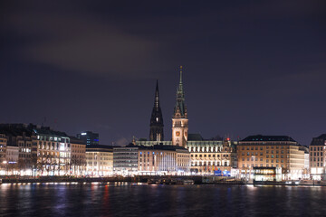 Naklejka na ściany i meble Night view of the old town and the skyline of Hamburg, Germany