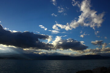 A sky full of clouds over the sea
