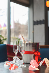 Romantic still life with bottle of champagne and two champagne glasses. Valentines day.