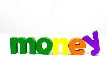 Children Alphabet wooden Blocks spelling the word money