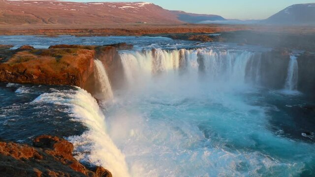 Fabulous sunrise on Godafoss waterfall. Captivating morning view of Skjalfandafljot river, Iceland, Europe. Beauty of nature concept background. Full HD video (High Definition).

