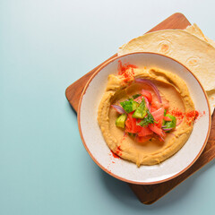 Mashed potatoes with vegetables. Vegan, vegetarian diet. Veggie salad with tomatoes and cucumbers and red onions.