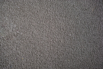 Fototapeta premium Gray doormat which is made from synthetic fibers.