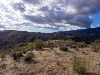 mountainous landscape and cloudy sky