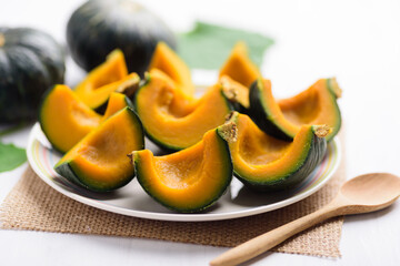 Boiled slice pumpkin on a plate ready to eating, Healthy vegan food