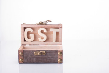 A chest with GST words isolated over white