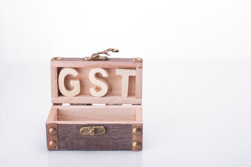 A chest with GST words isolated over white