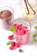 ice cream scoop with fresh fruit in glass