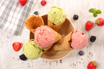 ice cream scoop with fresh fruit biscuit cone