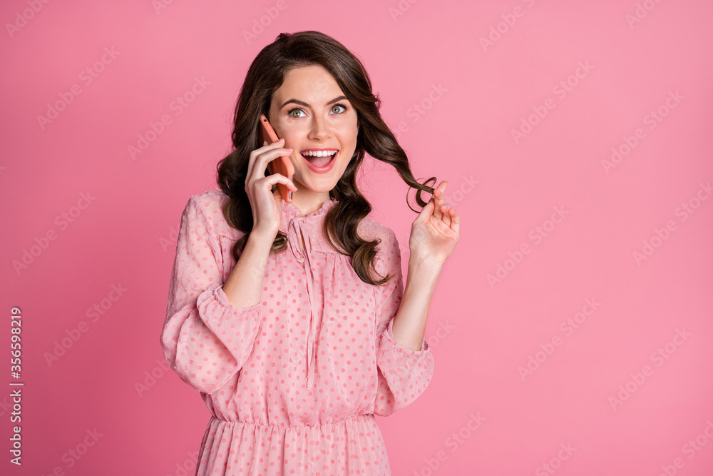 Poster Portrait of candid lovely pretty girl touch her haircut listen her friend tell incredible news call smartphone wear polka-dot clothes isolated over pastel color background