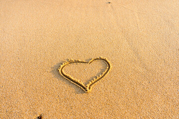 Love heart on beach romantic emotion on nature background.