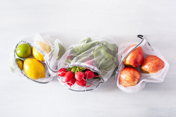 fruits and vegetables in reusable mesh nylon bag, plastic free zero waste concept