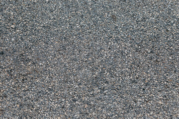 Texture gray asphalt background. Surface grunge rough asphalt. Top view of light grey asphalt. Asphalt texture pattern background. Car road, pavement, tile. Granular abstract uniform grainy surface