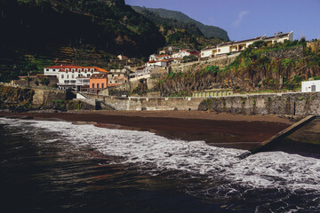 Fototapeta na wymiar Sunny winter day on the beach on the north coast of Madeira island, Porto Moniz and Seixal