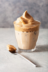 dalgona coffee in glass. trendy Instant coffee whipped with sugar and hot water