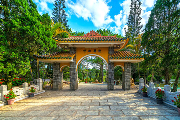 Fototapeta premium View in fron of Truc Lam monastery is an ancient temple to attract tourists. This place cultivates many Buddhists who are helpful to everyone in Da Lat, Vietnam