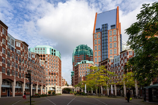 Street view of The Hague city center with the brick made skyscrapers imitating the traditional Dutch Flemish architecture, The Hague, Netherlands