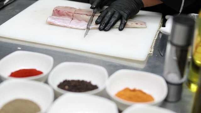 totuava fish cut by chet in a restaurant kitchen