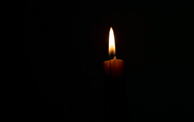 candles that are lit in the dark