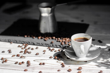 coffee cezve with fresh coffee and beans