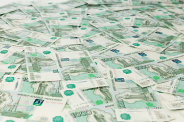 Fototapeta premium texture of money with soft focus on a white table