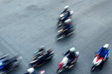 motorcycle driving fast on a city highway in Bangkok, Thailand