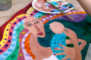 Children's drawing of a portrait in an artistic style. Drawing for mother's day. Abstract illustration.
