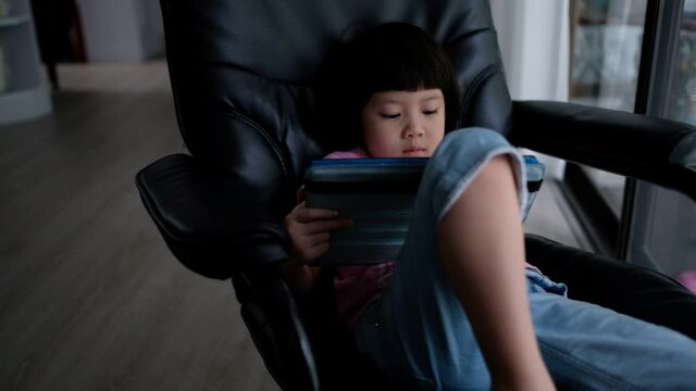 child addicted tablet, asian girl playing smartphone, kid use telephone, watching cartoon