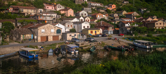 Fototapeta premium A small village on a hill near a lake in Montenegro