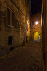 Fototapeta na wymiar Streets and buildings in Siena, Italy 