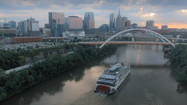 Aerial: Historical Steamboat on the Cumberland River in downtown Nashville, Tennessee, USA