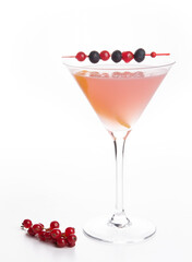 pink cocktail with blueberry currants with white background . High quality photo