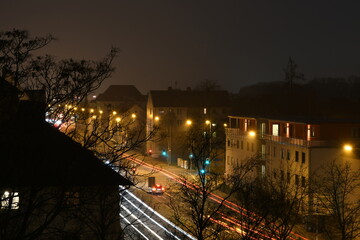 Fototapeta na wymiar cold but beautiful winter night in the city with big car trafic. Ingolstadt, Germany.