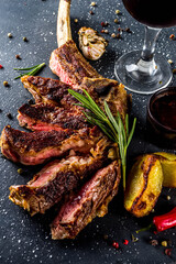 Cooking meat background. Fresh grilled meat  on dark grey table background. Top view. copy space