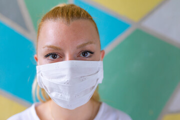 Young woman with face mask protection of Coronavirus.	