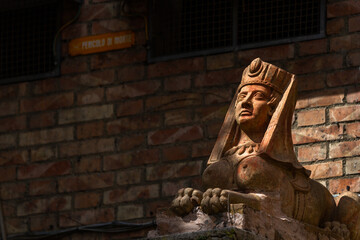 Streets and houses and sculptues in Siena Italy