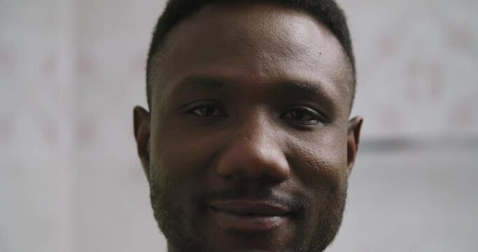 Portrait of Young Black Man with Toothy Smile