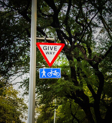 give way for pedestrians and cycle sign board