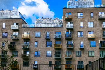 Aarhus, Denmark A modern building with greenhouses on the roof.