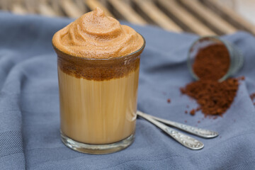 Trendy iced frothy ultra fluffy Dalgona instant Coffee drink