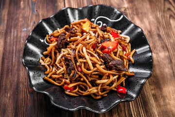 Uyghur cuisine dish tsomyan fried noodles beef 