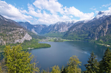 Abstract scenic panoramic landscape view of Lake Hallstatt with alpine mountain in Austria from observatory viewing platform (Hallstatt Skywalk Welterbeblick) is designed as UNESCO world heritage view