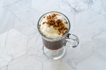 Homemade Alcoholic Amaretto Coffee with Cognac and Whipped Cream.